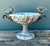 This exquisite vintage centerpiece bowl is a masterclass in French Chinoiserie elegance. The pedestal cachepot features a...
