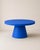 Round table in electric blue microcement, designed by Andrea Toffanin for Hood – Back & Forth Design. A sculptural and...