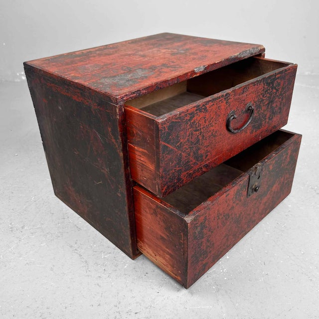 Antique Japanese cabinet with two drawers, Late Meiji Period. Dimensions: height 25.5 cm, width 31 cm, depth 23.5 cm. The...