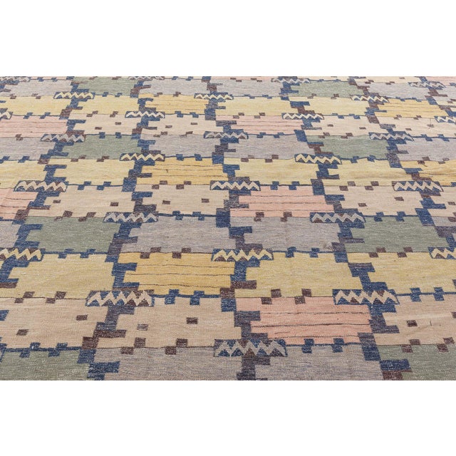 Modern Swedish Flat Weave Rug Size: 10'6" × 12'6" (320 × 381 cm) Color: Blue, Lavender, Pink, Taupe, Yellow Showcasing a...