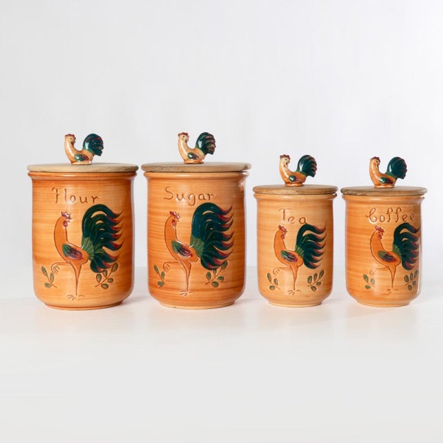 Pennsbury Pottery canister set of four. Wonderfully made with chickens on lids.