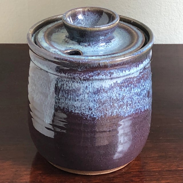 Offering a gorgeous studio stoneware honey pot. Hand thrown by artisans at the Clay Pot Studio in Spotswood, New Jersey....