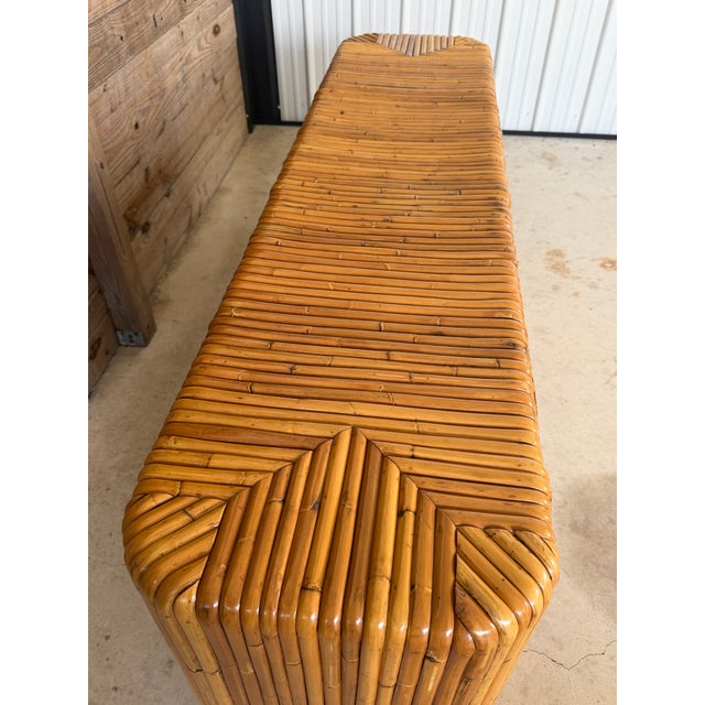 Beautiful vintage waterfall split rattan nine-drawer dresser featuring a fully wrapped rattan exterior and striking...