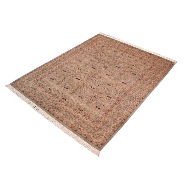 Designed with mesmerizing intricacy and gorgeous color palette, this hand-knotted masterpiece demonstrates the beauty and...