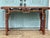 Delicately decorated rectangular table with a pierced frieze, on square legs. Vibrant colors and patterns that attractive...