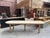 This immense oak communal table has been fully restored. It consists of a very large oval top and a base made up of four...