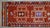 Ruby Red 1960s Vintage Hand-Knotted Primitive Turkish Rug Runner Ancient Alien Motif - 2′8″ × 10′8″ For Sale - Image 8 of 13