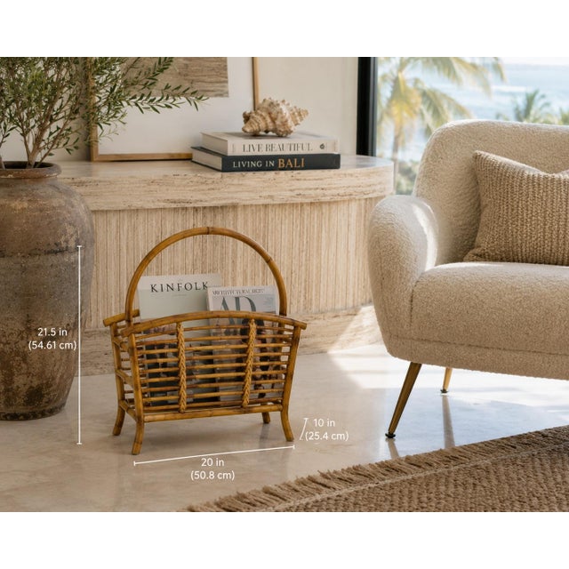 A beautifully handcrafted vintage bent bamboo and rattan magazine rack, featuring elegant curved lines, a sculptural...