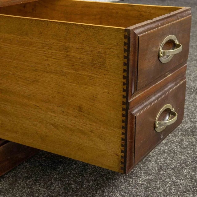 This is a fine quality antique mahogany roll top desk most likely made by Holland & Son or Maples. The satinwood veneered...