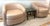 Vintage pair of swivel chairs. Freshly upholstered in a Dedar coated raffia-like neutral colored fabric. Rounded back....