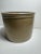 A rustic stoneware crock. I believe this was originally used to store butter. Now it could be used as a planter or a...