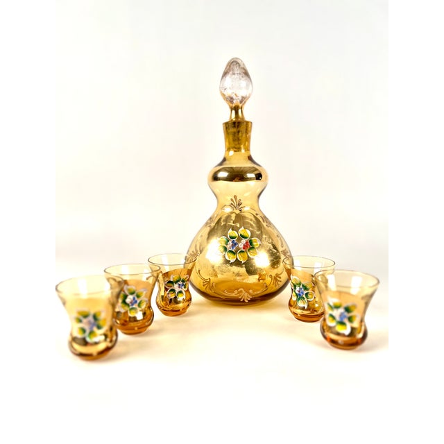 This Rare 1950s Bohemian Crystal Gold Hand Painted Decanter and Five Shot Glasses Set with Applied Raised Floral and Gold...