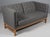 Erik Jørgensen two-seat sofa new upholstered with grey Magrethe wool from Nevotex. Frame of oak. Model EJ 315/2, made by...