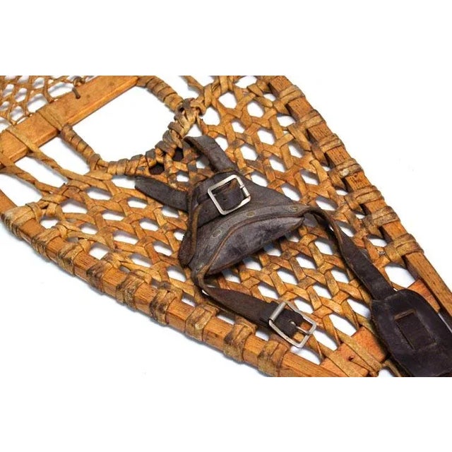 Enjoy the spirit once used to conquer a walk in deep snow. Add these authentic vintage snow shoes to your home décor....