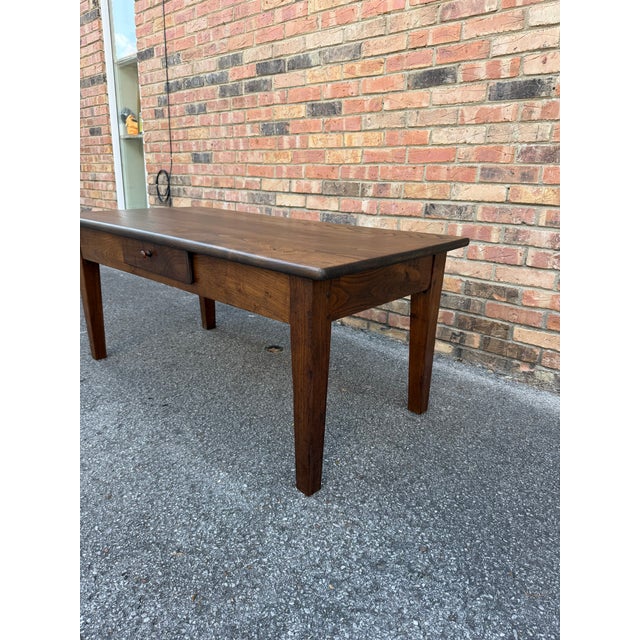 This is a lovely French coffee table! The design is rustic with natural detail and texture. There is a single centered...