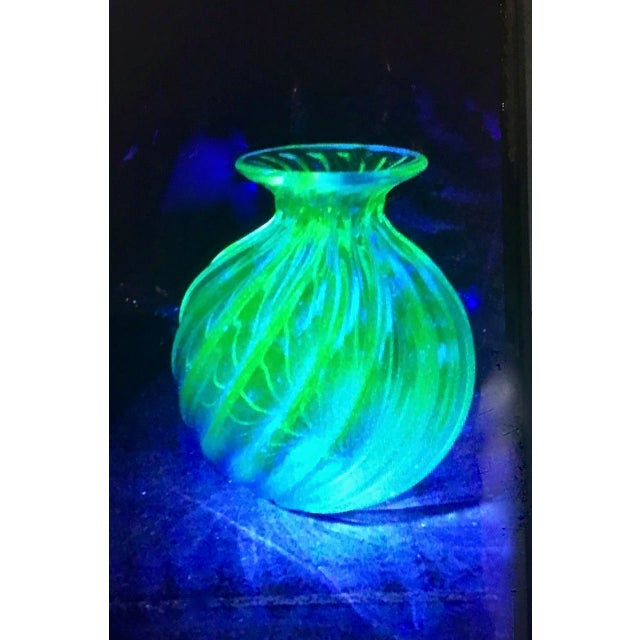 This is a very good example of the work of Archimide Seguso. The small vase of swirled blue and clear glass is signed with...