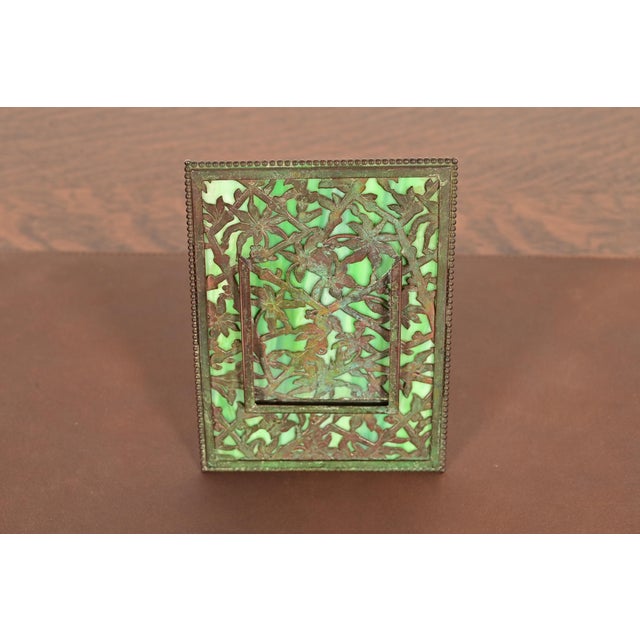 A beautiful Arts & Crafts or Art Nouveau period "Grapevine" pattern bronze and slag glass picture frame with verdigris...