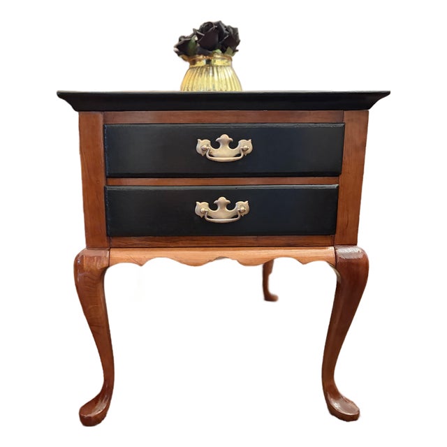 1960s Refinished Queen Anne Style Side Table Featuring Painted Black Drawers and Gold Hardware. For Sale