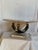 An 80s tessellated stone bowl on an Art Deco revival black pedestal with gold ball details. Whether used as a decorative...