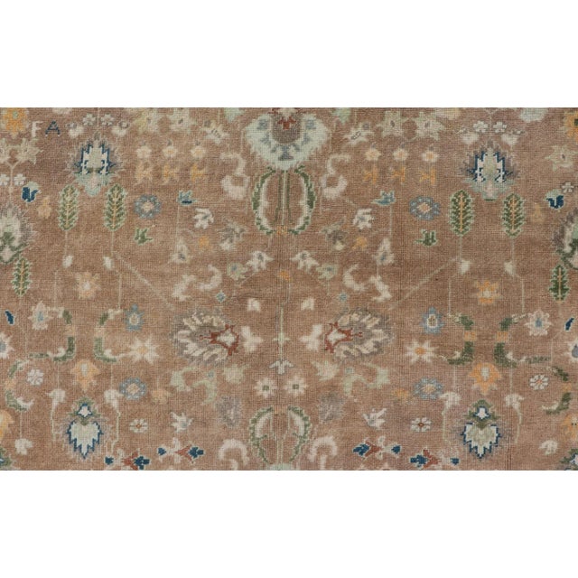 Textile Mid 20th Century Colorful Turkish Oushak Rug in Salmon Background With All-Over Floral Design For Sale - Image 7 of 13