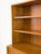 High-quality, two-part bookcase by WK Möbel from the 1960s. The base cabinet has two doors and two shelves, topped by a...