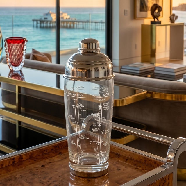A gorgeous, authentic 1950s mid-century modern "cobbler" style cocktail shaker designed and manufactured by the renowned...
