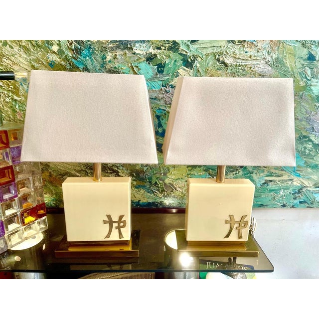 An elegant pair of table lamps by French designer Jean-Claude Mahey, produced in France during the 1970s. Each lamp...
