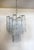 Italian vintage chandelier in Murano glass and nickel-plated metal structure. The armor polished nickel supports 30 large...