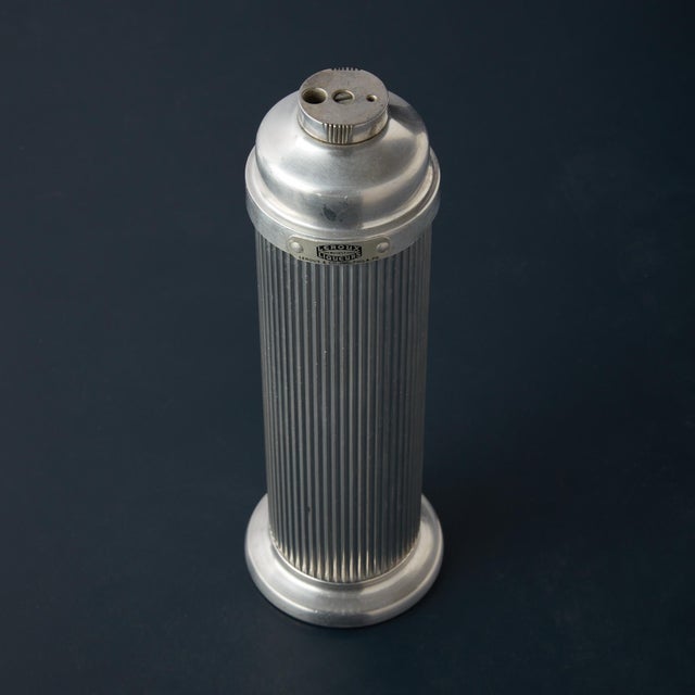 1940's Emson Ezee Pour Cocktail Shaker made of Polished Ribbed Aluminum. Made in the 1940’s and is marked on the bottom of...
