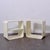 Two white lacquered wood bookcases, created by Italian architect and designer Carlo de Carli between the late 1960s and...