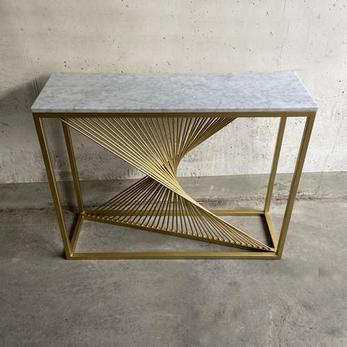 Sculptural console table with a frame featuring an arrangement of gilt metal linear elements, composed in a dynamic,...