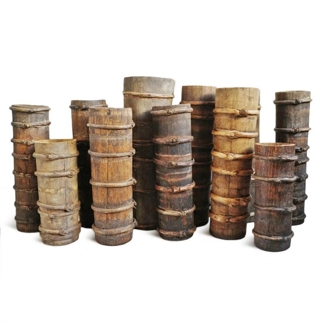 Original old Chinese wood cylinder butter churns with hand carved willow strap ties. Each is beautifully unique with age,...