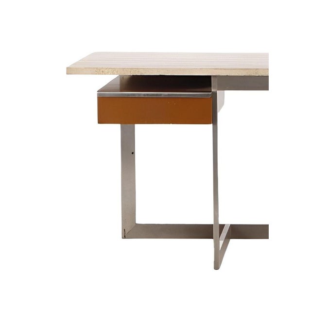 A striking large French executive desk, dating to circa 1970, distinguished by its bold modernist design and refined use...