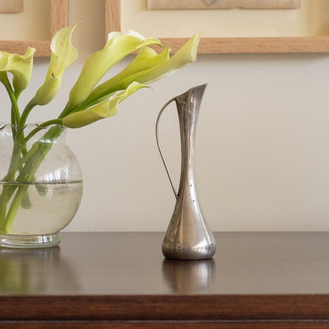 Lovely decorative silver plated bud vase from France, 1930s. Sculptural shape with fluted rim and and handle detail....