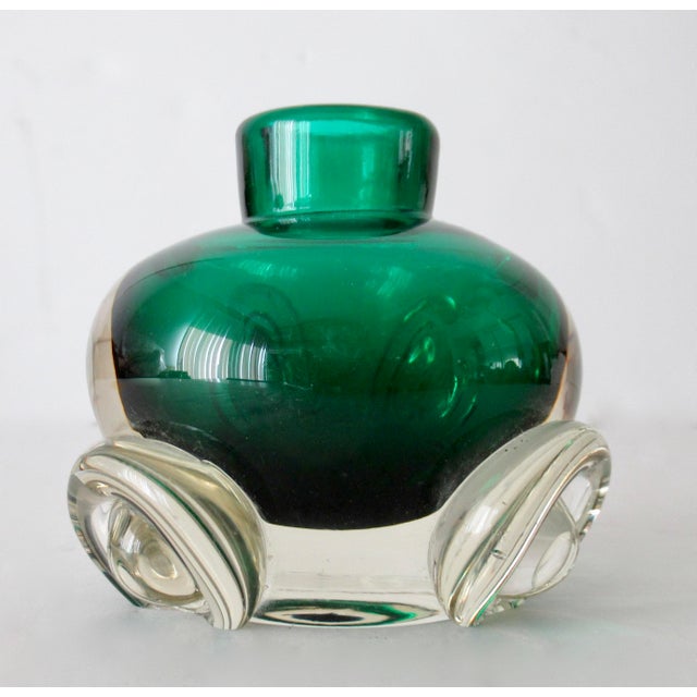 C.1970's; Italian, Hand-Blown thick Murano bud vase in a green to emerald green inner coloration with a clear transparent...