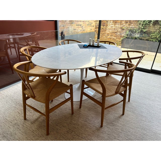 Attributed Knoll Saarinen 78" Oval Dining Table — White Marble Top Authentic Knoll Saarinen 78" oval dining table with...
