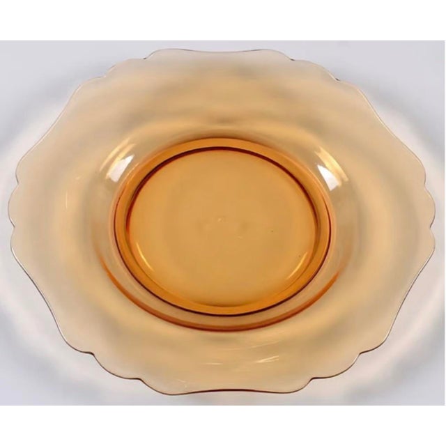 Amber glass is such a gorgeous color for any season of the year. These transparent amber glass plates by Cambridge glass...