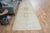 This vintage hand-knotted area rug is a semi-antique vintage area rug. The '70s Eastern region of Anatolian's unique rug...