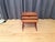 A set of three teak tables from the 1960s. In good condition. The medium-sized table shows some discoloration on the top....