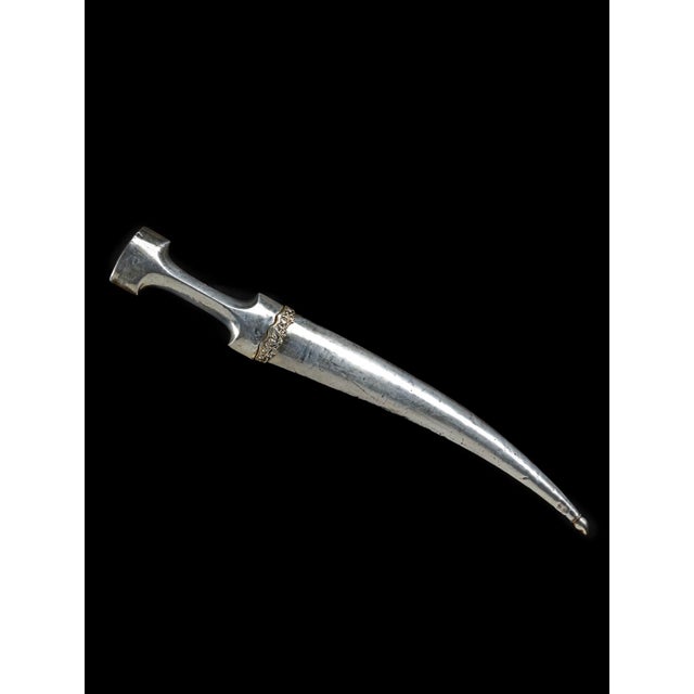 Gold-damascened blade, the scabbard with vine frieze and tughra of Mahmud II A plain silver hilt with scalloped shoulder,...