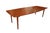 A formidable Danish teak dining table from A/S Polexim Co. in Copenhagen, a table with room for the whole family! with its...