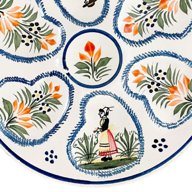 Beautiful vintage French faience decorative oyster plate by Henriot Quimper featuring a quintessential Breton and country...