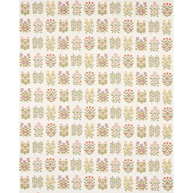 Based on original artwork that was hand-drawn in our studio, Annika Floral Tapestry in multi-on-ivory derives its charm...