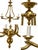 This is a traditional polished-brass chandelier with strong Neoclassical and Federal-style influences. Its design is...