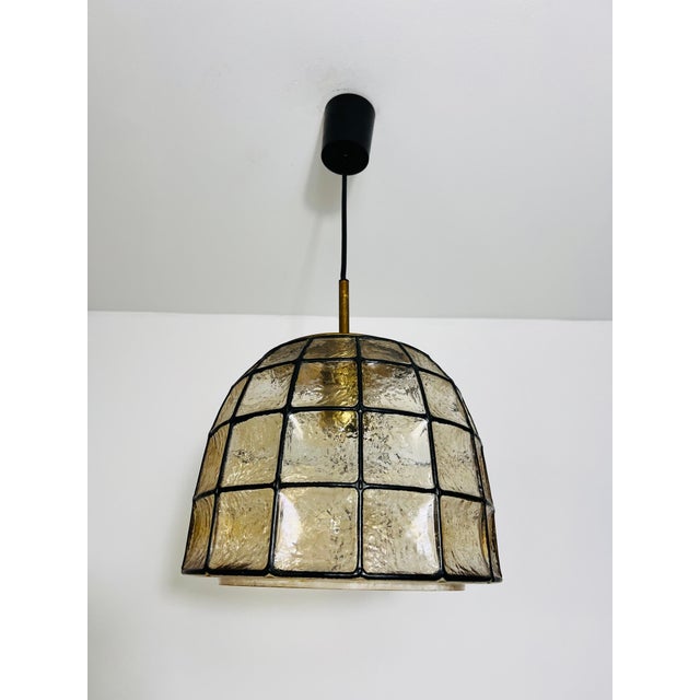 This exceptional ceiling lamp by Glashütte Limburg, crafted in the 1960s, stands out with its rare, oversized diameter,...