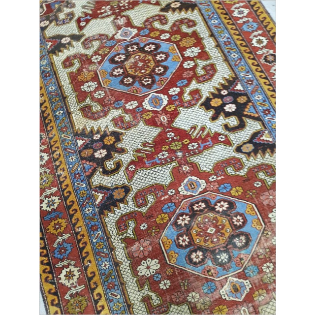 Antique Caucasian gallery rug specifically featuring the distinctive geometric design. Charactarized by its strong tribal...
