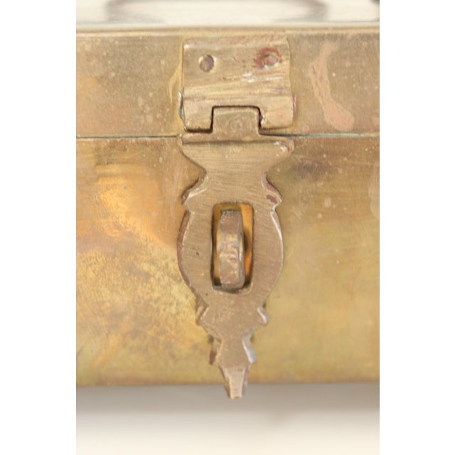 Antique footed French unlacquered Box with swing handle The box is designed with a top swing handle and four bun feet.