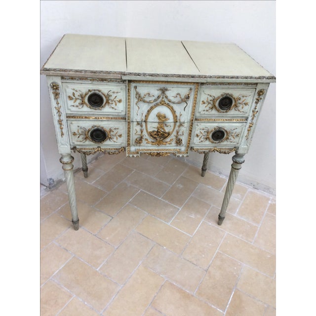 Over the top vanity table with a lift top mirror and fold up sides. The painted finish is in great condition. The top has...