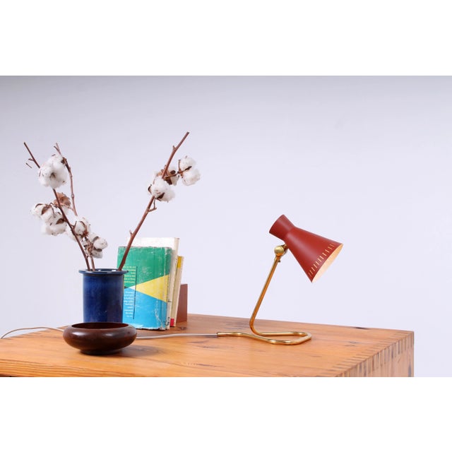 Red and Brass Diabolo Table Light by Asea, 1950s, in None conditions. Designed 1950 to 1959 European Plug (up to 250V).The...