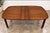 Stunning super rare walnut brutalist style Tabago Canada dining table with to extension leaves. This piece has fantastic...